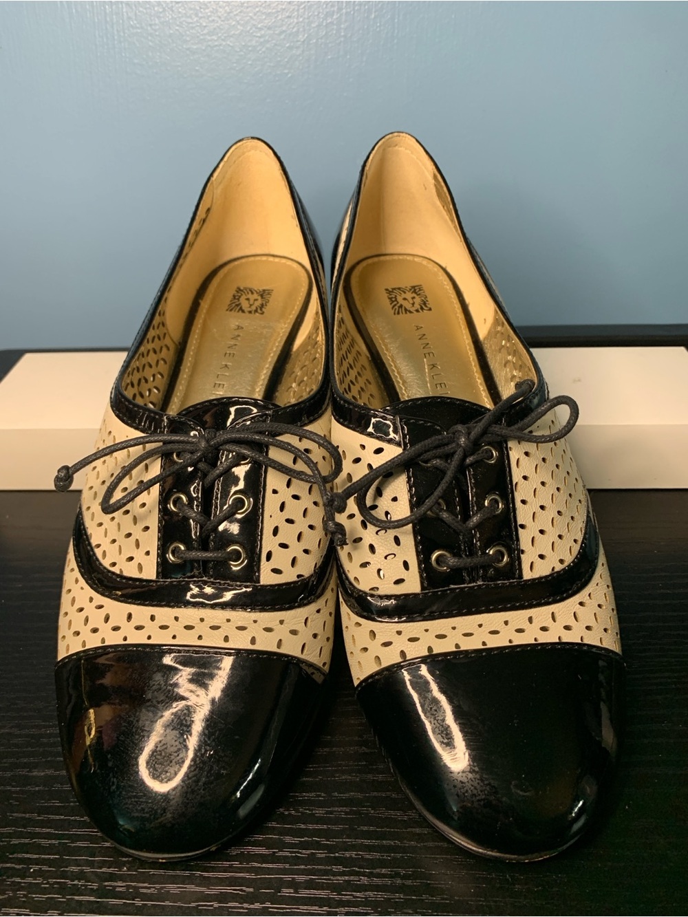Anne Klein Black and Cream Perforated Lace-Up Flats